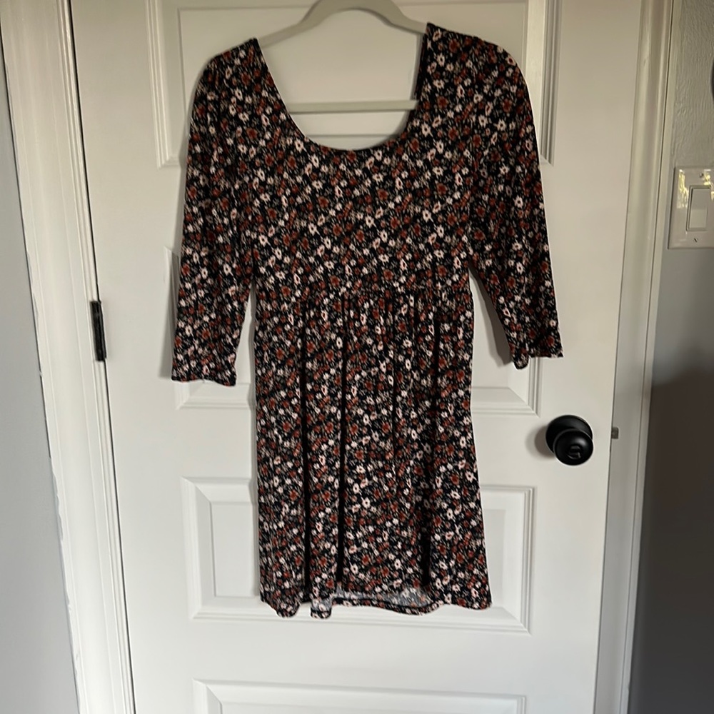 Short, long sleeve floral dress.